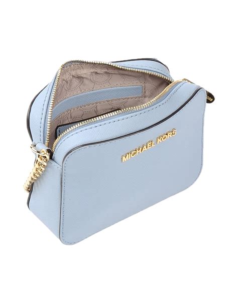 michael kors bag light blue|Michael Kors blue crossbody bag.